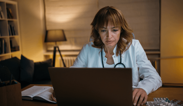 Doctor looking up information on cash balance retirement plans